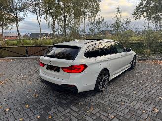 BMW 5-serie M550 5 Touring M550 d xDrive Panorama Trekhaak HUD !! picture 7