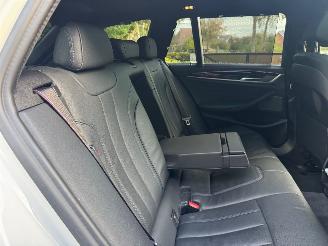 BMW 5-serie M550 5 Touring M550 d xDrive Panorama Trekhaak HUD !! picture 17