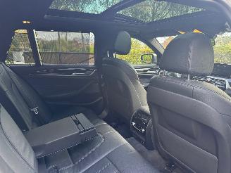 BMW 5-serie M550 5 Touring M550 d xDrive Panorama Trekhaak HUD !! picture 15