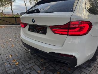 BMW 5-serie M550 5 Touring M550 d xDrive Panorama Trekhaak HUD !! picture 12