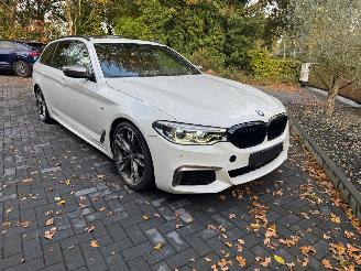 BMW 5-serie M550 5 Touring M550 d xDrive Panorama Trekhaak HUD !! picture 21