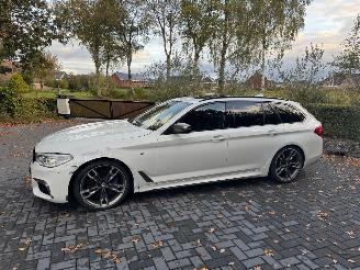 BMW 5-serie M550 5 Touring M550 d xDrive Panorama Trekhaak HUD !! picture 28