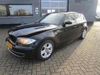damaged passenger cars BMW 1-serie 118D High Executive 2009/6