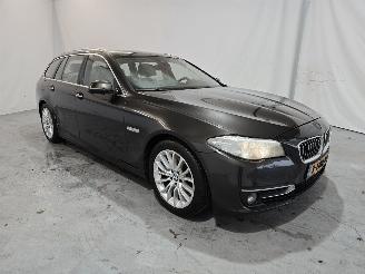 damaged passenger cars BMW 5-serie 518d Luxury Edition 2014/2
