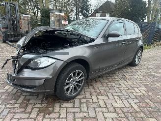 skadebil auto BMW 1-serie 116i 2009/8