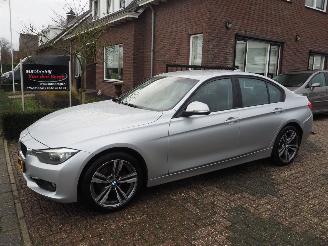 Damaged car BMW 3-serie 320i High executive 2012/5