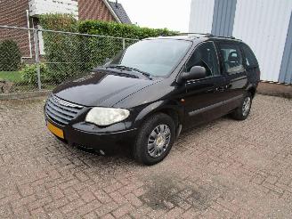 krockskadad bil auto Chrysler Voyager 2.4i Navi Clima 7-Persoons 2007/1