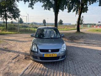 Suzuki Swift Swift (ZA/ZC/ZD1/2/3/9), Hatchback, 2005 / 2011 1.3 VVT 16V picture 2