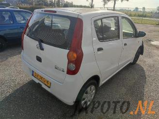 Daihatsu Cuore Cuore (L251/271/276), Hatchback, 2003 1.0 12V DVVT picture 5