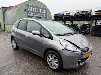 Vaurioauto  passenger cars Honda Jazz 1.4 Hybrid 65KW Autom. Clima Pano Elegance NAP 2012/2