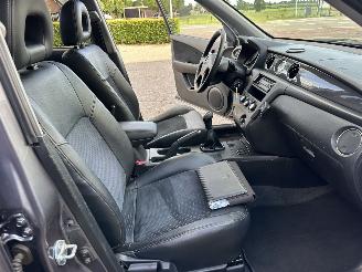 Mitsubishi Outlander gereserveerd 2.0 Turbo 201pk 4WD - uniek - 2x schuifdak - airco - leer + alcantara + stoelverw - privacy glass - rijdbaar picture 52