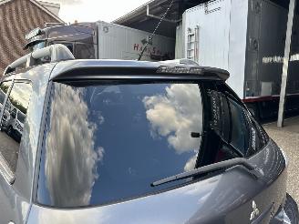 Mitsubishi Outlander gereserveerd 2.0 Turbo 201pk 4WD - uniek - 2x schuifdak - airco - leer + alcantara + stoelverw - privacy glass - rijdbaar picture 73