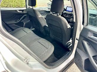 Ford Focus Wagon 1.0 EcoB Hybrid 135pk 6-bak Con - 97dkm nap - navi - airco - cruise - pdc - line + front assist - lmv picture 66
