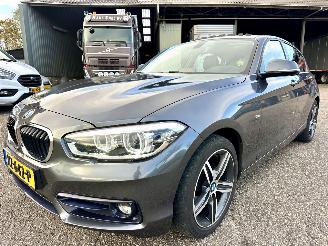 BMW 1-serie 118i 136pk 6-bak Cent Sportline 5drs - schuifdak - nap - leer - navi - stoelverw - licht + regensensor picture 2