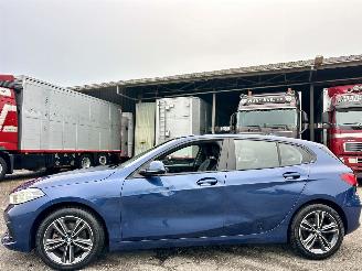 Damaged car BMW 1-serie 118i 136pk 7-Traps aut High Exe - nap - virtual - nav - cam - front + line assist - leer + stoelverw - sfeerverl 2021/4
