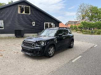 Schadeauto Mini Countryman HYBRIDE PLUG IN SE 4AWD AUTOMAAT NAVI CLIMA LEER LED PDC B.J 2019 2019/2