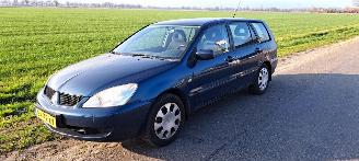 krockskadad bil auto Mitsubishi Lancer 1.6 16v Wagon 2007/10