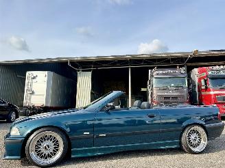 Damaged car BMW 3-serie cabrio 320i 150pk exe M-Sport individual - hardtop - 17 inch bbs breedset - verlaagd - clima - leer - boston grün 1997/6